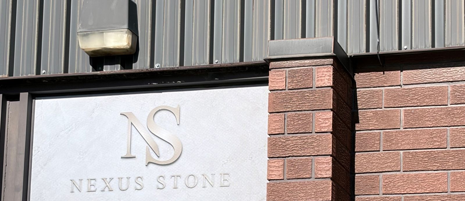 Nexus Stone workshop entrance sign in Mississauga